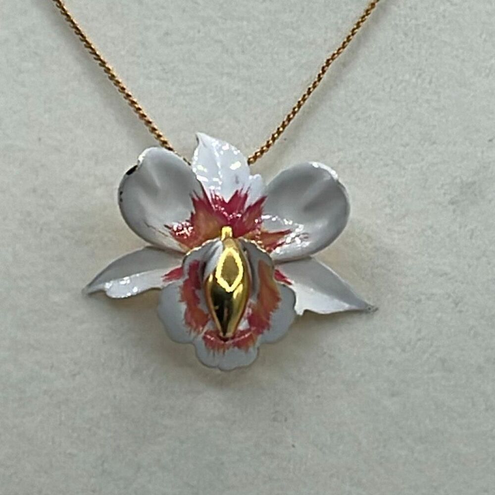 Vintage delicate enamel orchid pendant necklace with prominent gold colored meta